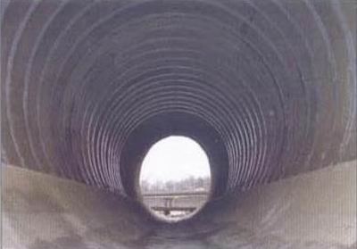 Repaired culverts relined with fiber-reinforced shotcrete.