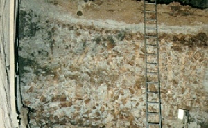Voids filled with grout of the highly porous embankment fill